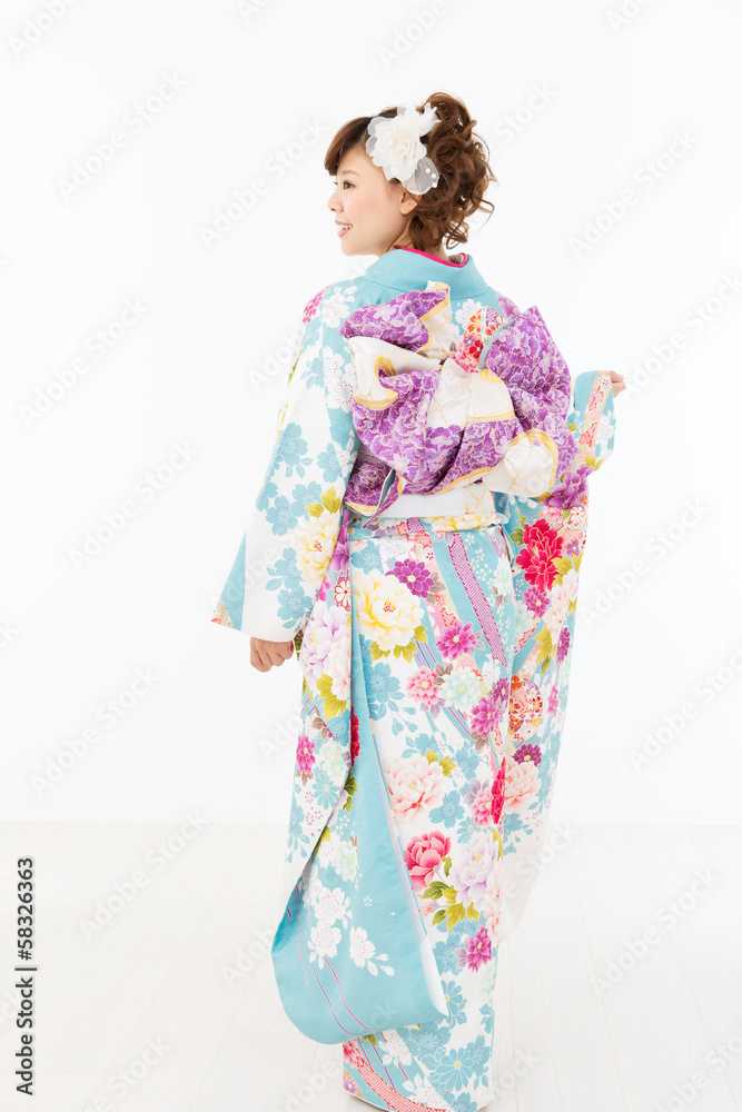 Beautiful asian kimono woman on white background Beautiful asian kimono woman on white background