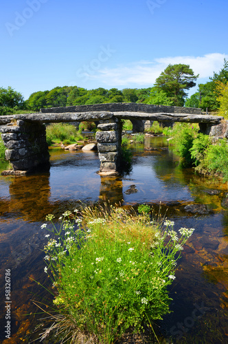Clapper bridge in Dartmoor National Park, Devon England UK