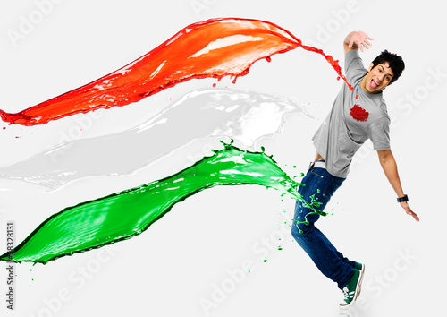 Tricolor paints being splashed on a man