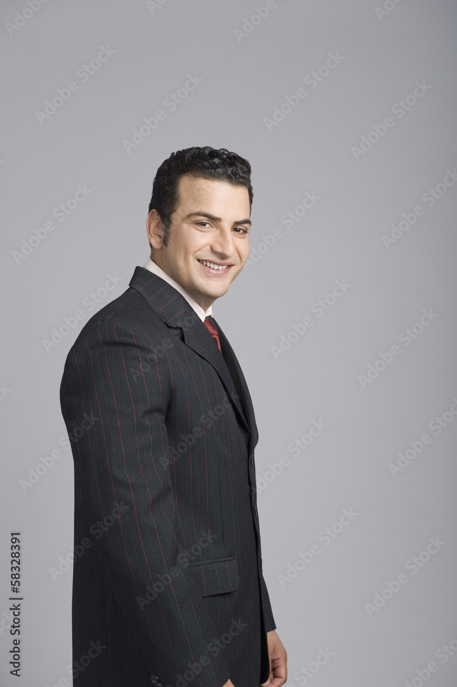 Portrait of a businessman smiling Portrait of a businessman smiling