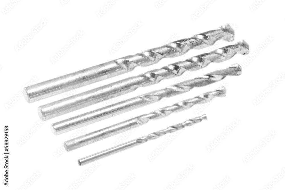 Close-up of drill bits arranged in a descending order Close-up of drill bits arranged in a descending order