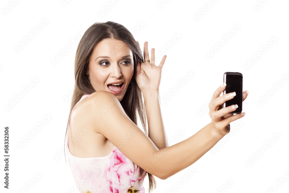 nice girl make a self-portrait with her smartphone nice girl make a self-portrait with her smartphone