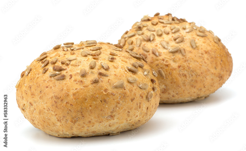 Round sandwich bun with sunflower seeds isolated on white backgr Round sandwich bun with sunflower seeds isolated on white backgr
