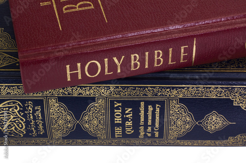 Close-up of the Koran and the Bible