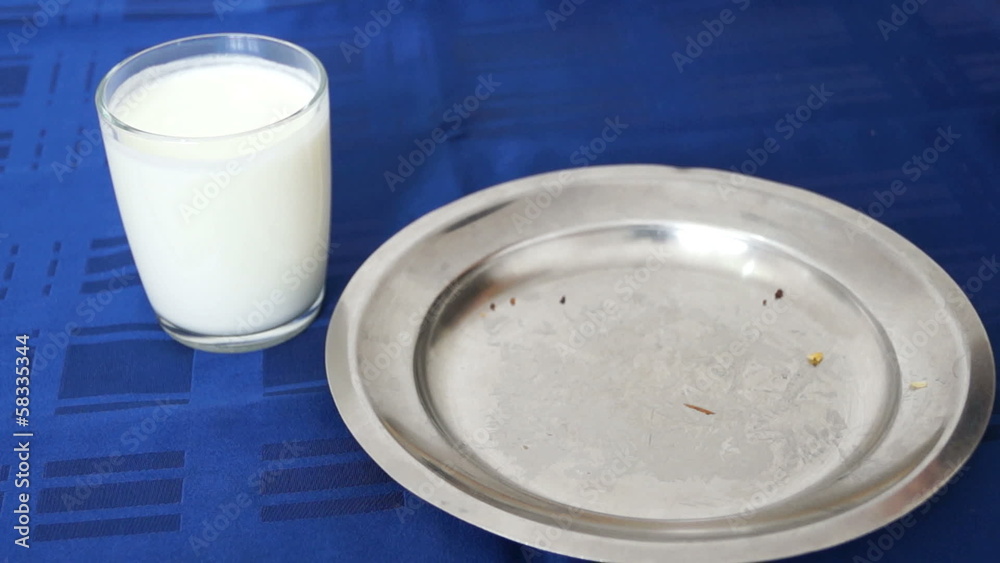 Eating burek (börek) with cheese and drinking yogurt Eating burek (börek) with cheese and drinking yogurt