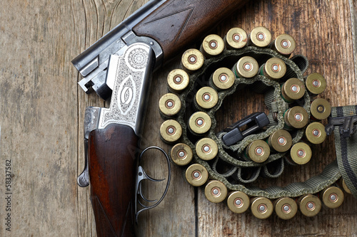 vintage hunting gun with shells