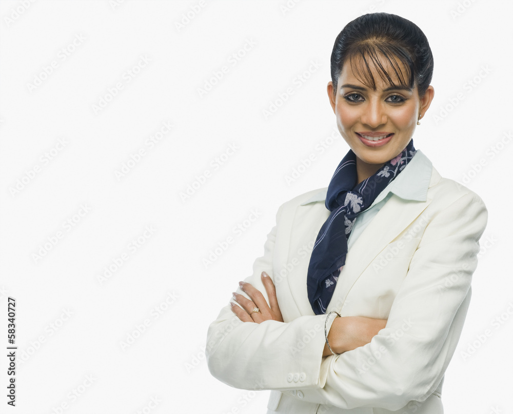 Portrait of a businesswoman with arms crossed Portrait of a businesswoman with arms crossed