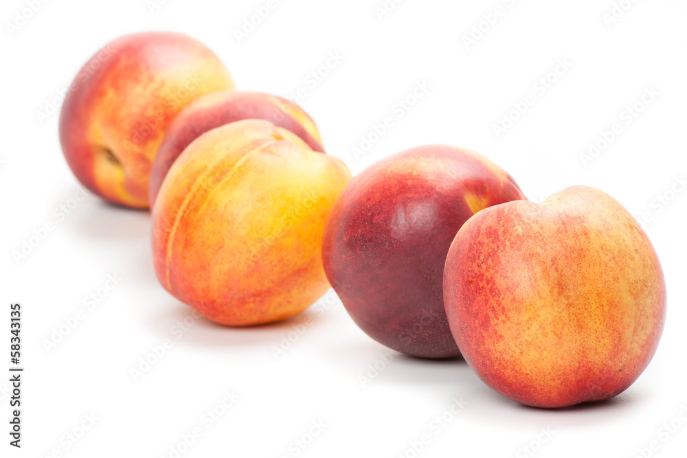 Ripe peaches fruits isolated on white Ripe peaches fruits isolated on white