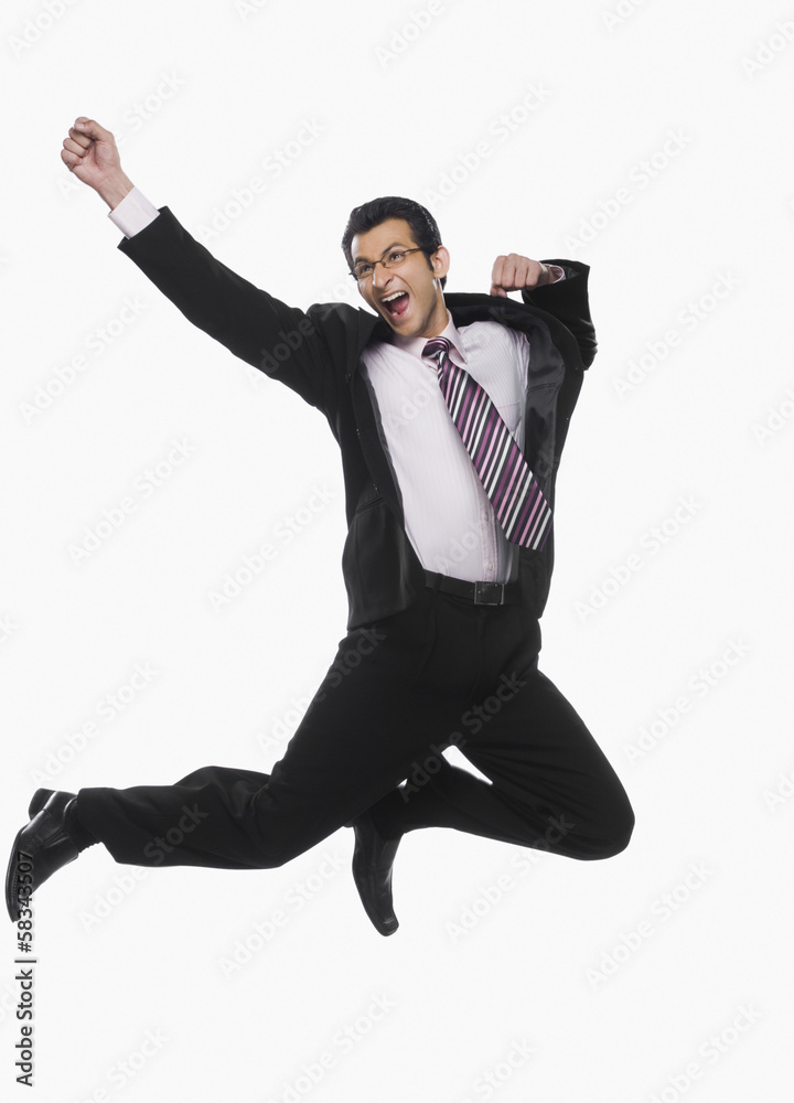 Businessman jumping