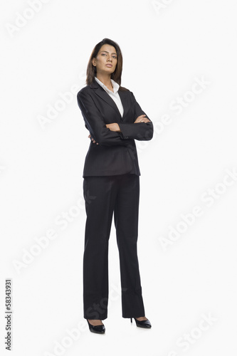 Portrait of a businesswoman standing with her arms crossed