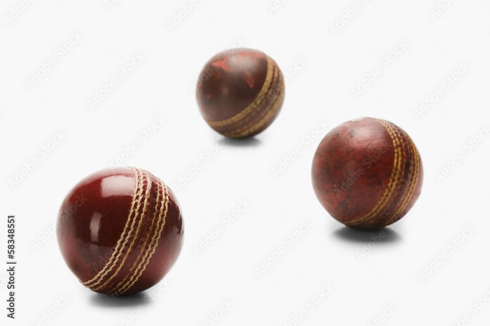 Obraz premium Close-up of old and new cricket balls