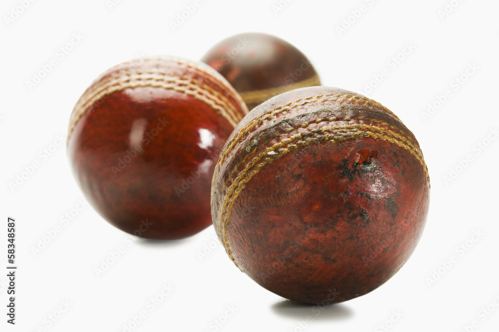 Obraz premium Close-up of old and new cricket balls