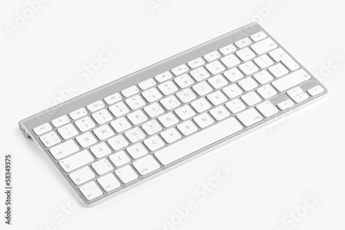 Wireless computer keyboard isolated on white background photo