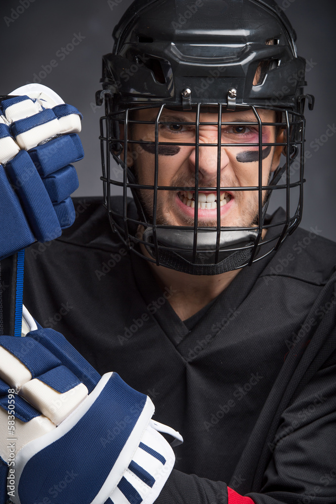 Obraz premium Close up of Angry face of hockey player.