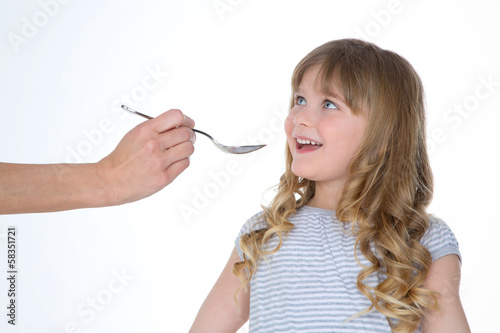 girl is waiting to take the syrup