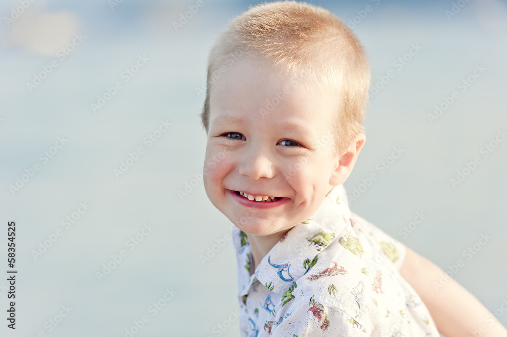portrait of a smiling child on sea portrait of a smiling child on sea