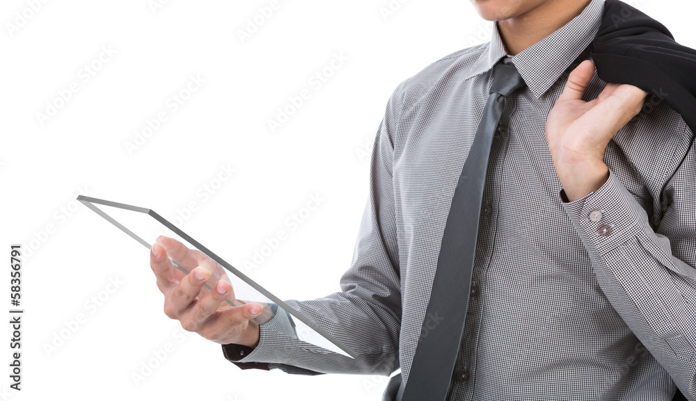 Business man using glass transparent touch screen device agains Business man using glass transparent touch screen device agains