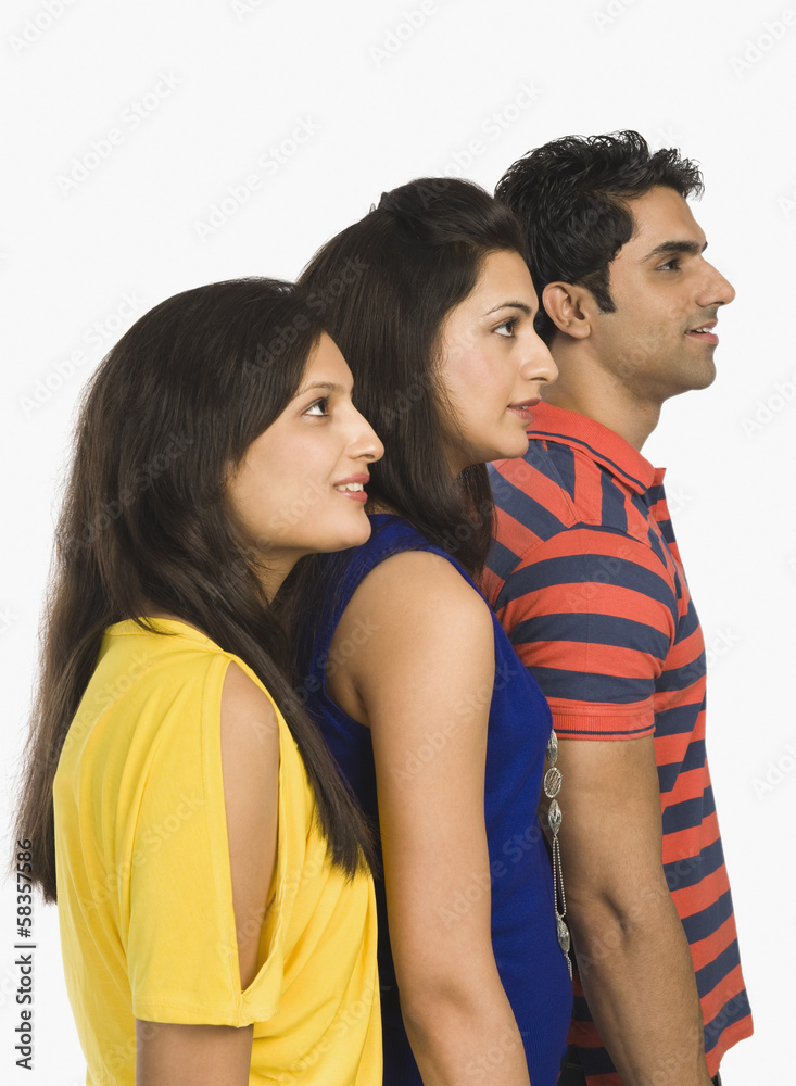 Friends standing in a row Friends standing in a row