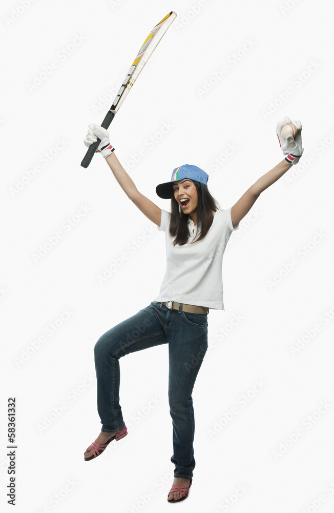 Portrait of a female cricket fan cheering Portrait of a female cricket fan cheering