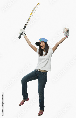 Portrait of a female cricket fan cheering © imagedb.com