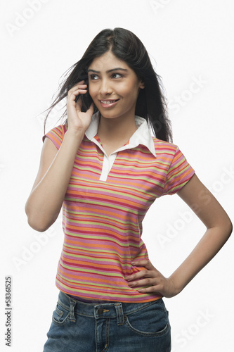 Close-up of a woman talking on a mobile phone