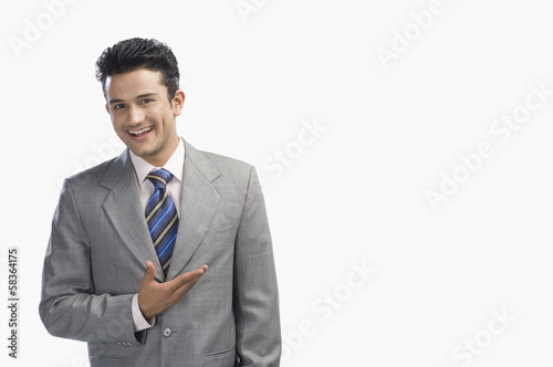 Portrait of a businessman gesturing