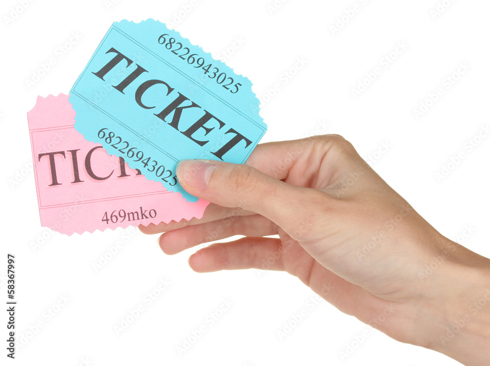 Woman's hand holding a colorful tickets Woman's hand holding a colorful tickets