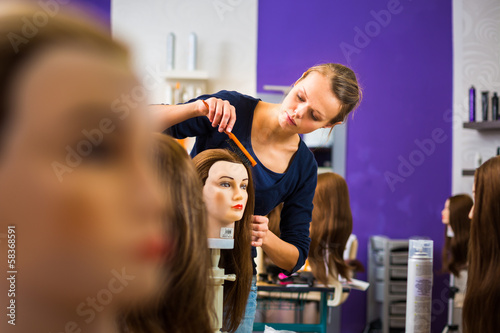 Pretty female hairdresser/haidressing apprentice