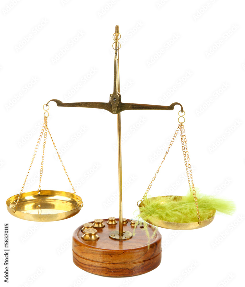 Balance scale with feather isolated on white Balance scale with feather isolated on white