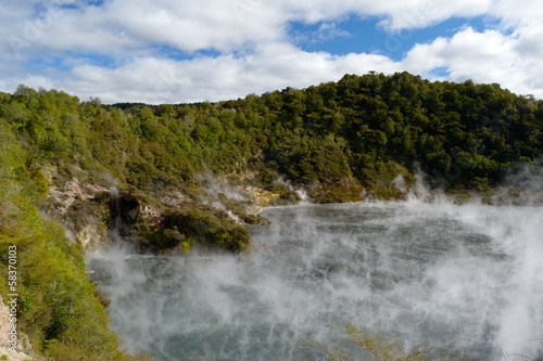 Steaming geo-thermal crater and lake in Waimangu Thermal Park