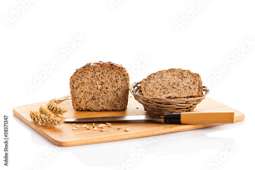 brown seed  biobread  isolated on white background photo