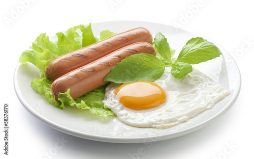 Roasted sausages and fried egg