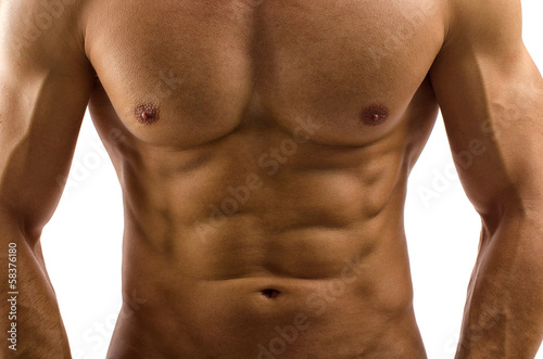 Close up on perfect abs. Strong bodybuilder with six pack