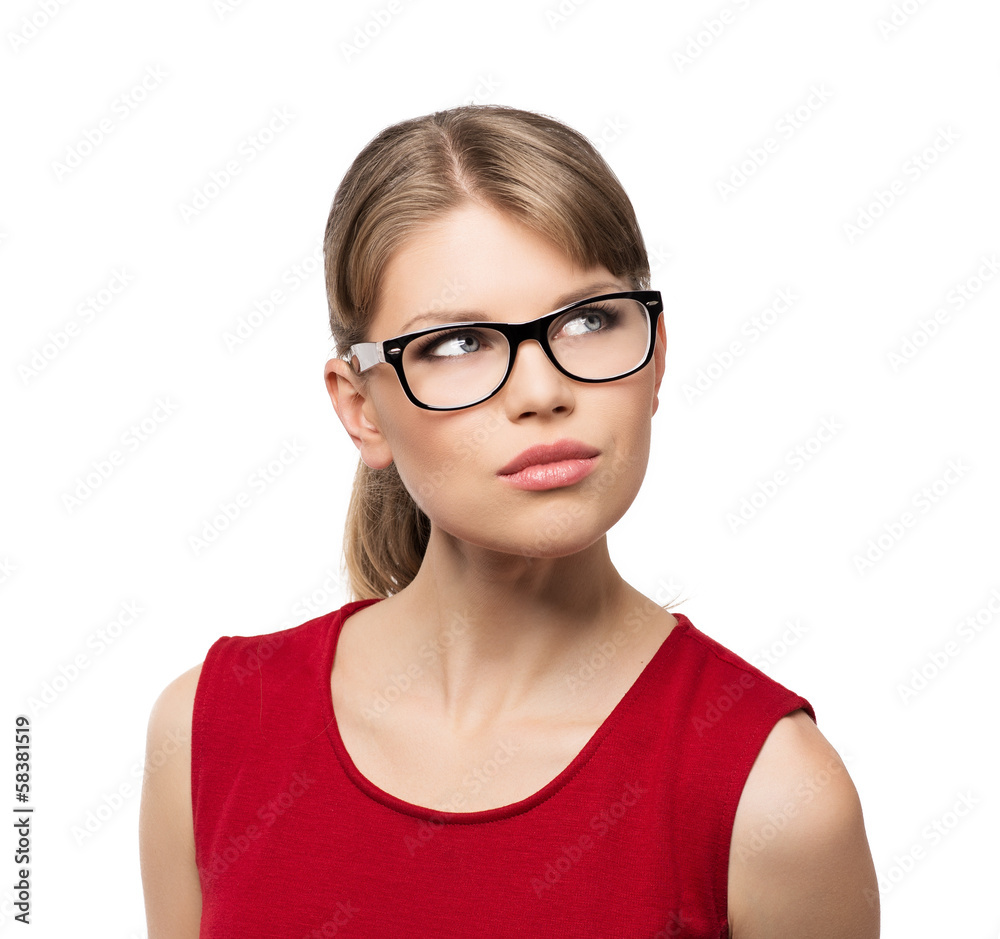 Attractive blonde in stylish specs looking aside, isolated