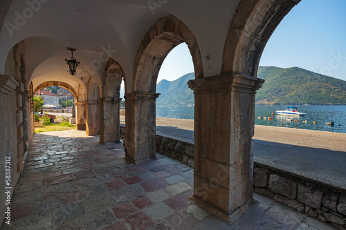 Dark archway in the old house in Perast town, Montenegro