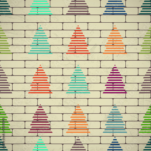 Christmas trees on a brick wall