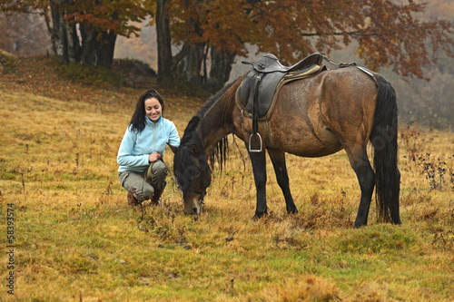 Horseback riding in the mountains © kyslynskyy