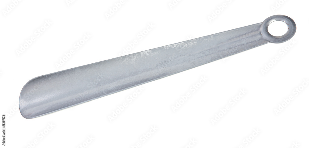 metal shoehorn on a white background metal shoehorn on a white background
