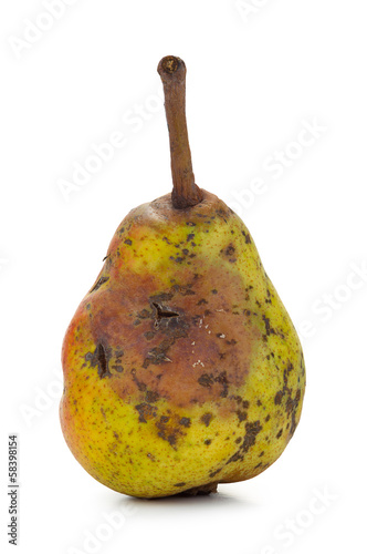 Rotten pear in three positions