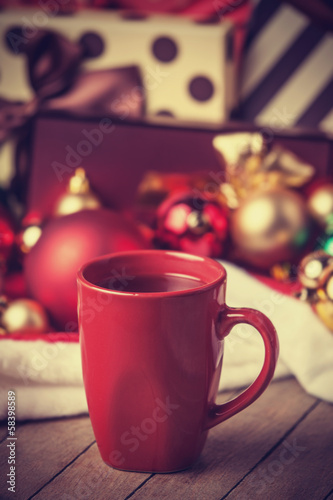 Cup of coffee and gifts