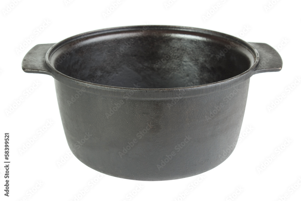 Old empty cast iron cooking pot , isolated on white