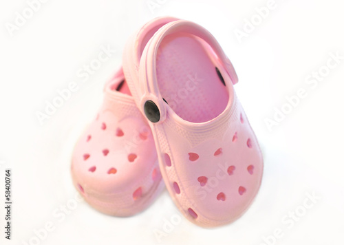 Baby pink rubber summer shoes.
