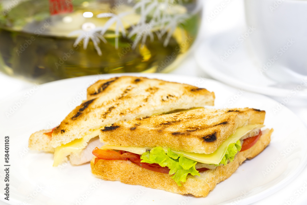 sandwich with tea on a white background in restaurant sandwich with tea on a white background in restaurant