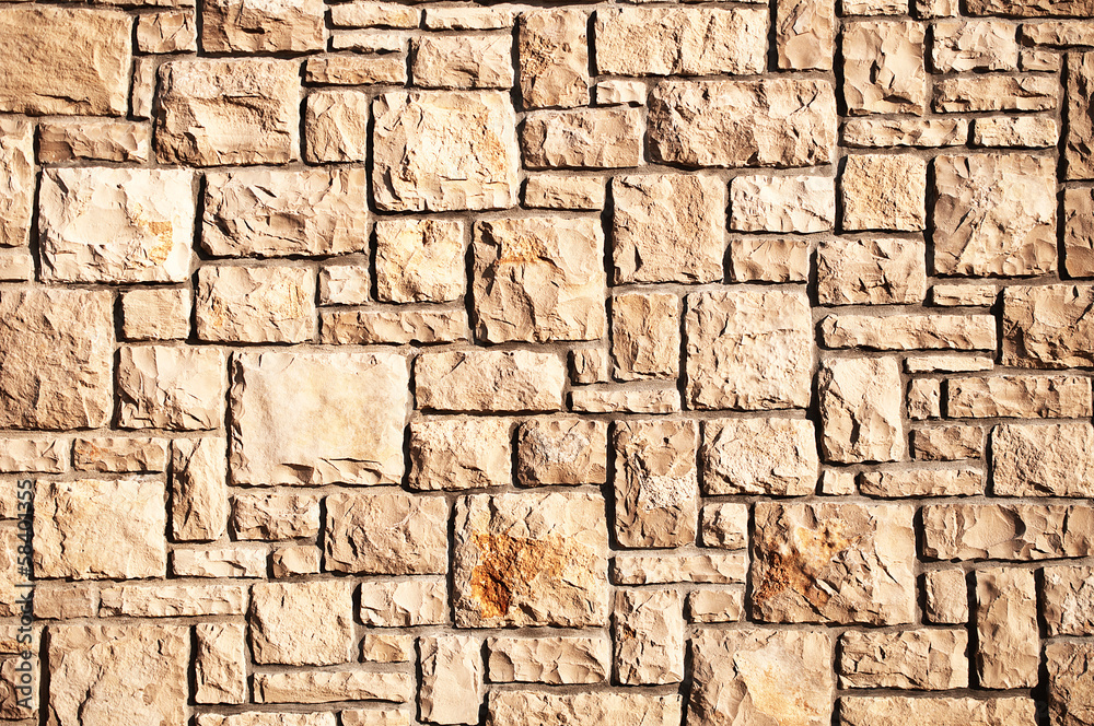 Fototapeta premium Graven stone-wall texture