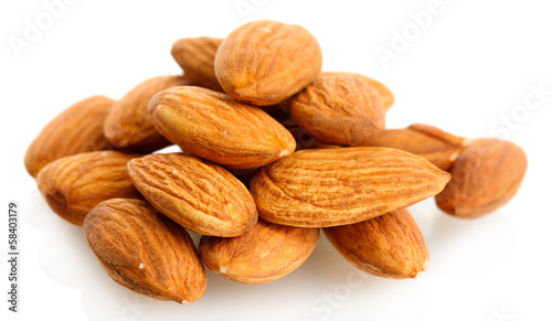 tasty almonds nuts, isolated on white