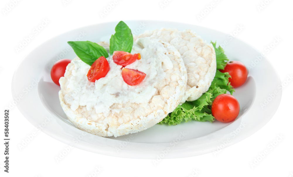 Tasty crispbreads with vegetables, isolated on white Tasty crispbreads with vegetables, isolated on white