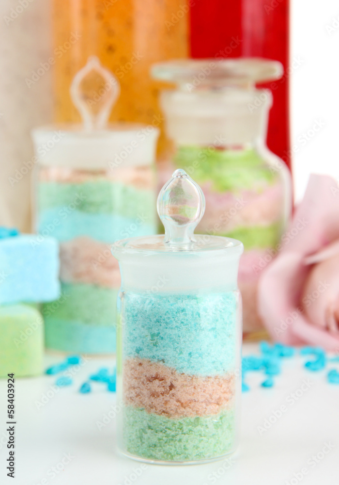 Aromatic salts in glass bottles and body scrubs, isolated Aromatic salts in glass bottles and body scrubs, isolated