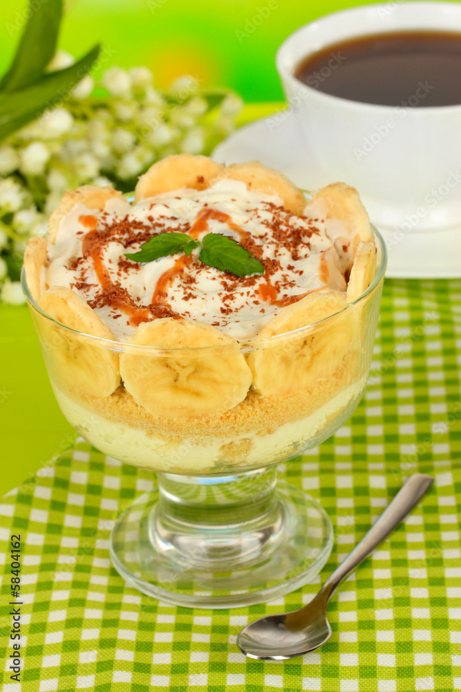 Delicious dessert with banana and caramel on table close-up Delicious dessert with banana and caramel on table close-up