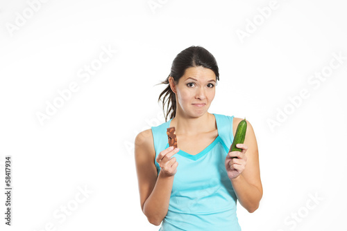 Choosing between a vegetable and a chocolate bar