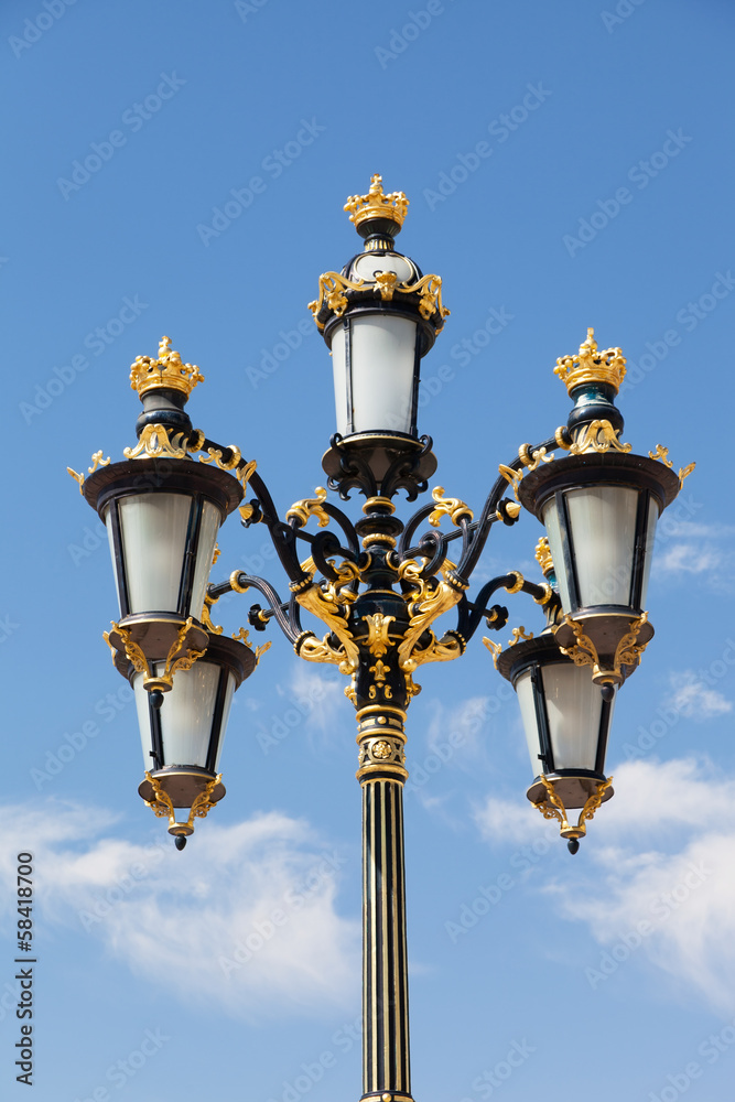 Decorative lamp near the royal palace in Madrid, Spain